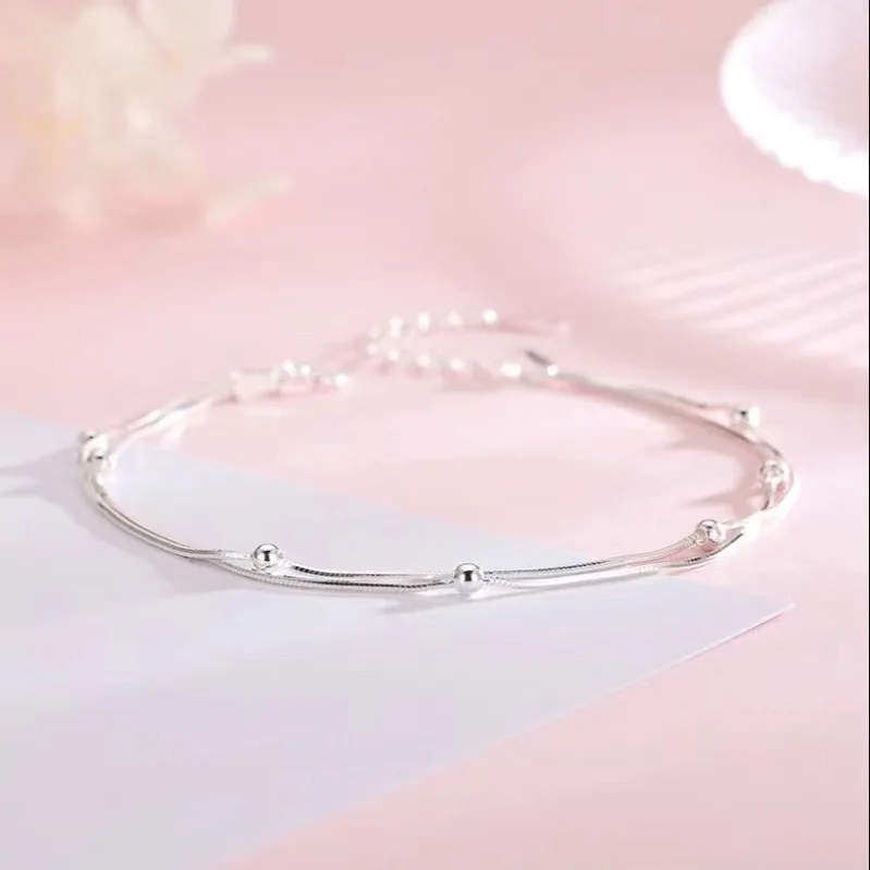 925 Sterling Silver Crossing-Strand Bracelet with Heart Detail — additional product view
